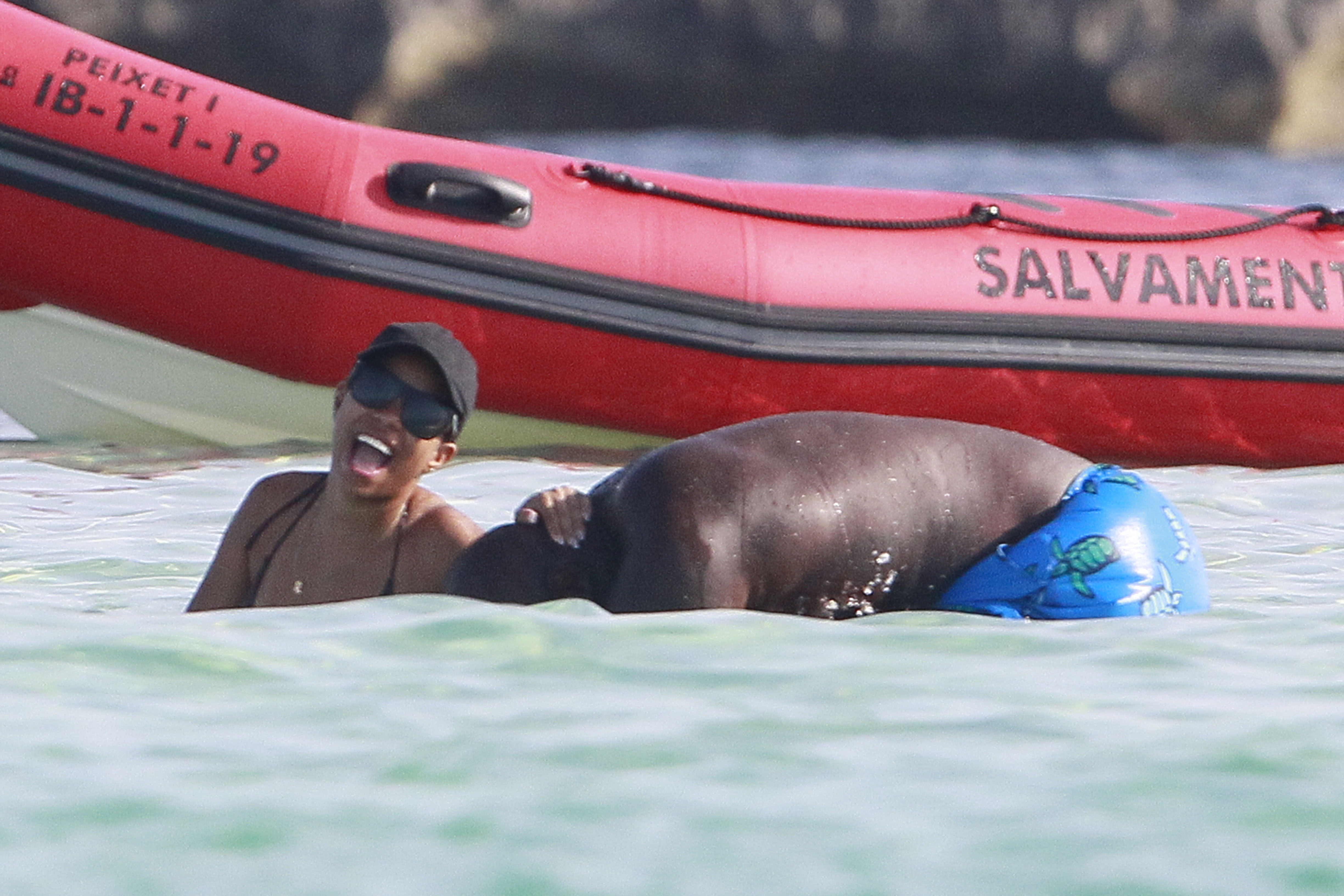 Shaquille O'Neal goes swimming in Formentera, Spain with new girlfriend