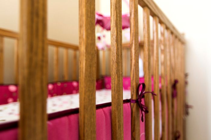 Close up of wooden slats on crib