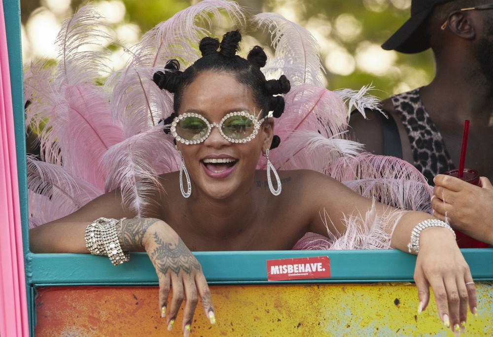 Rihanna wears pink feathered costume to Cropover
