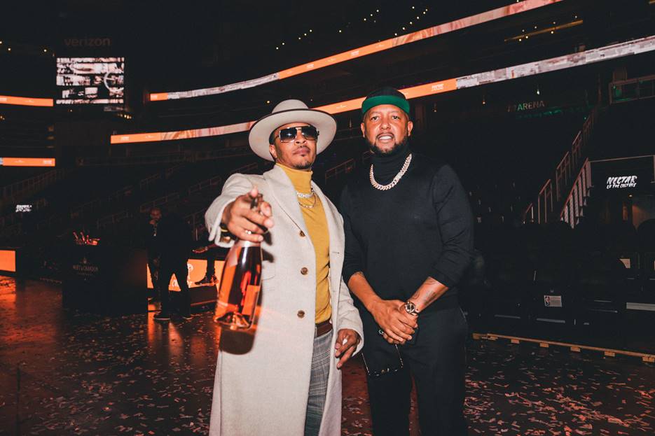 T.I. and Teheran "Tee" Jones aka Exclusive Game at Moët & Chandon Nectar of the Culture dinner at State Farm Arena