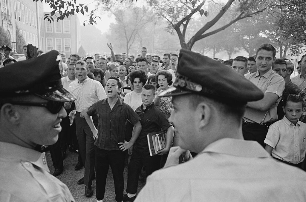 Policemen Near Crowd Of Students