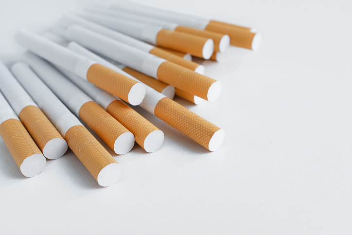A Pack Of Cigarettes With An Air Filter On A White Table. Prevention Of Bad Habits And Addictions. Selective Focus. Copy Space For Text.
