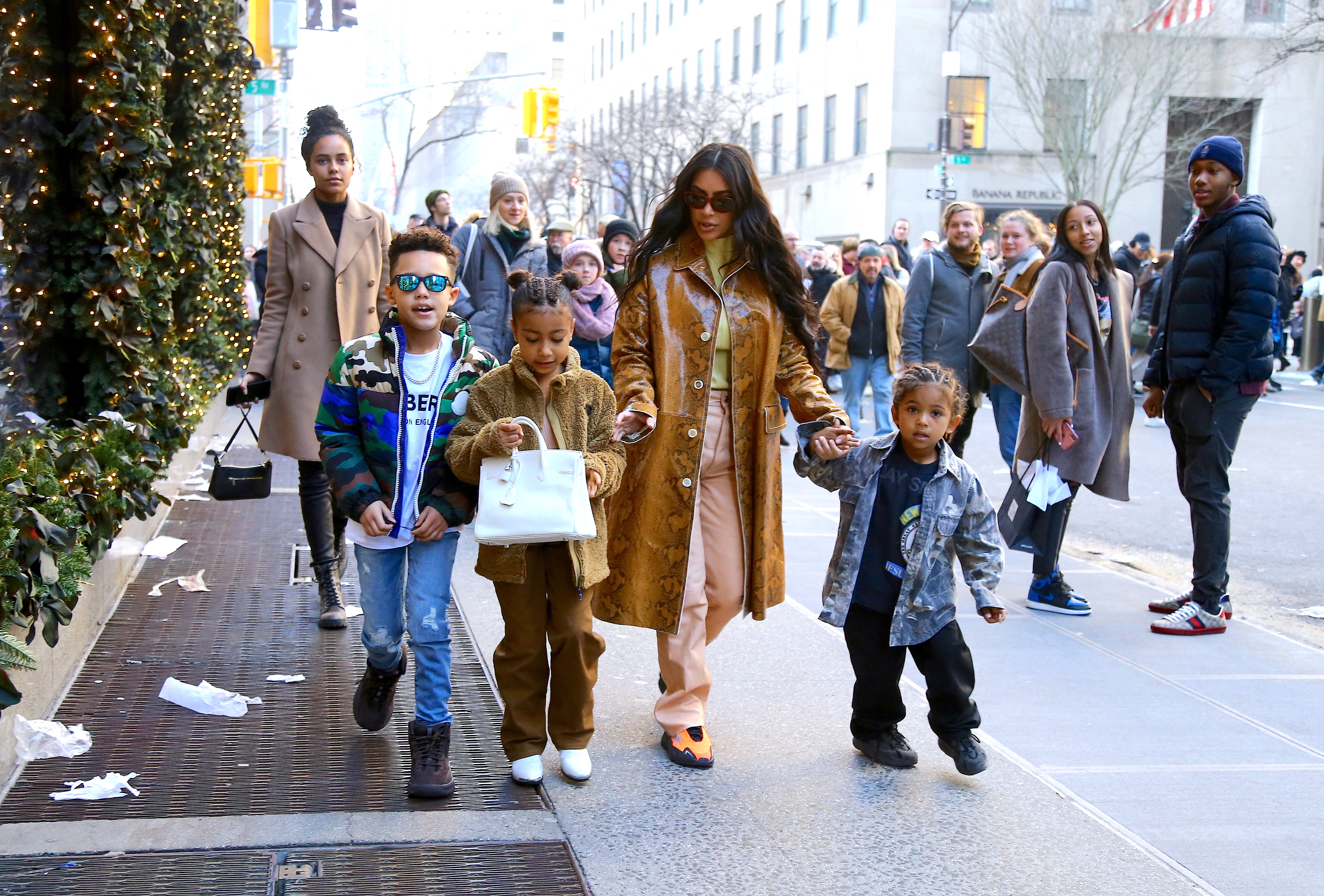 Kim Kardashian West shops at Saks Fifth Avenue with Saint West and North West