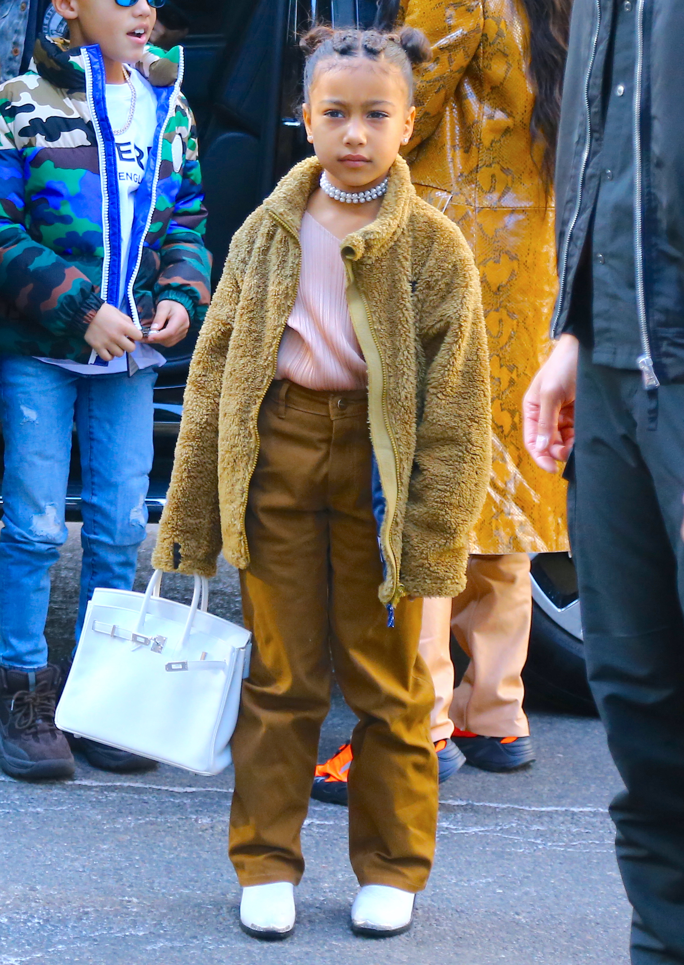 North West was photographed carrying a $10,000 Birkin bag in NY