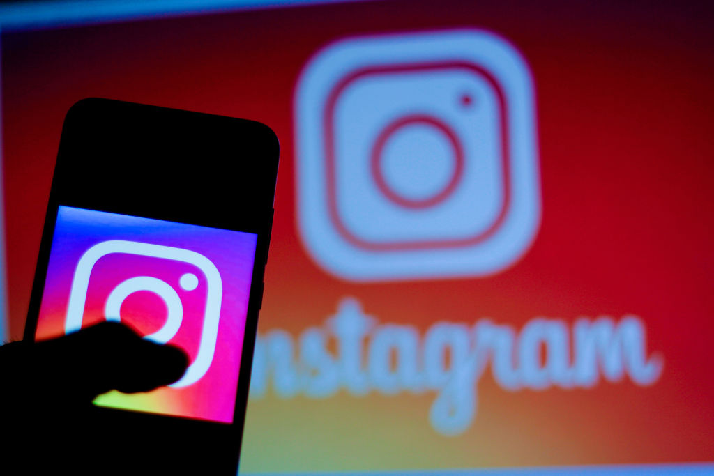 In this photo illustration the Instagram logo is seen...