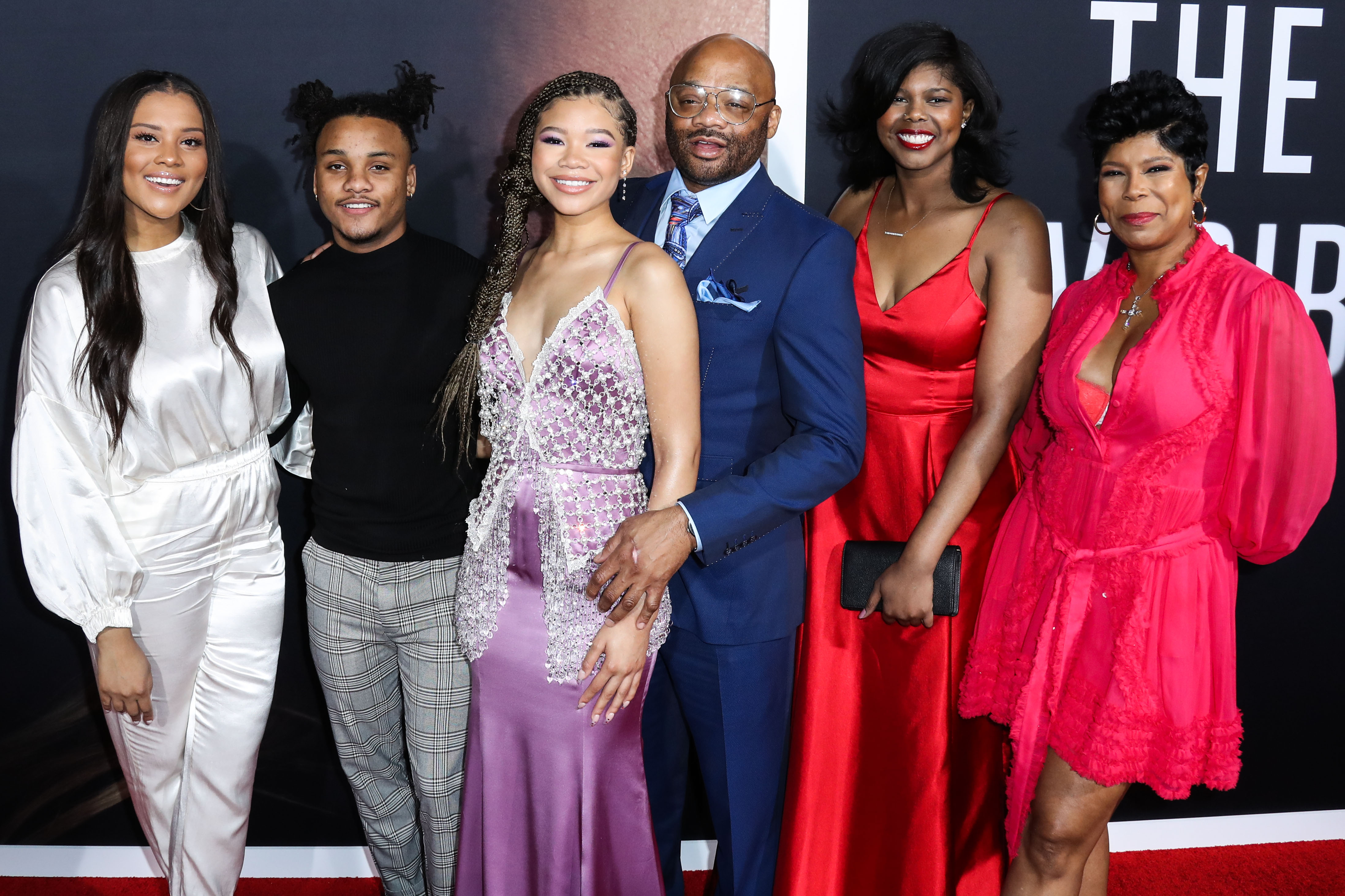 Storm Reid and her dad Rodney, mom Robyn, sisters Iman and Paris and brother Josh at The Invisible Man Premiere