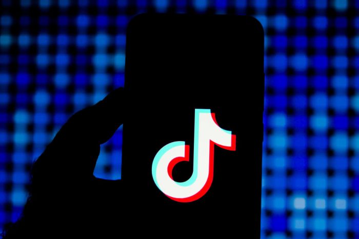 In this photo illustration a TikTok (Douyin) logo seen...