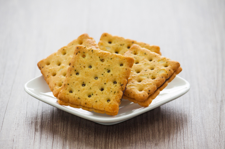 A Plate Of Cracker Biscuit On Wooden Table