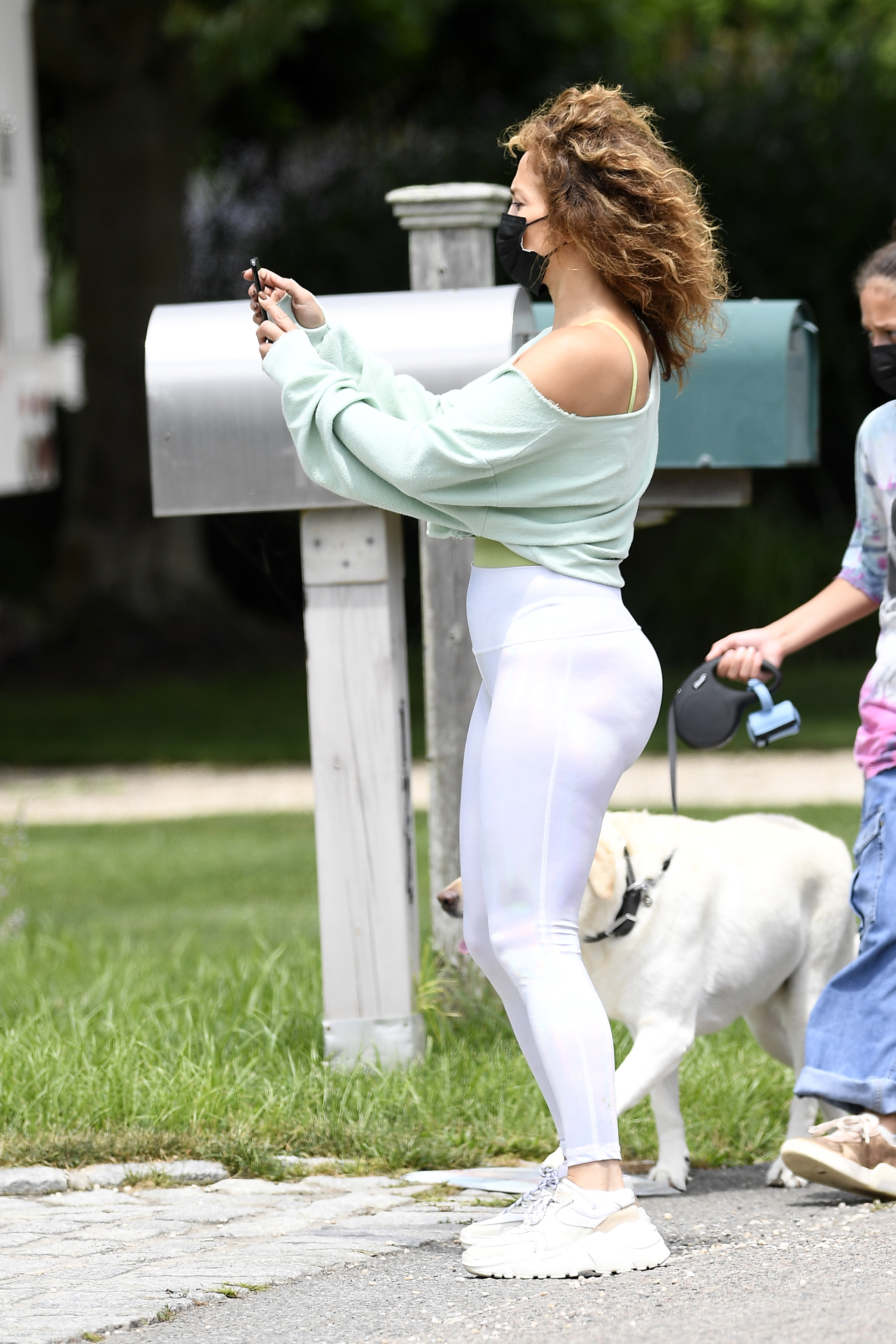 Jennifer Lopez walks dogs with kids Max and Emme in the Hamptons