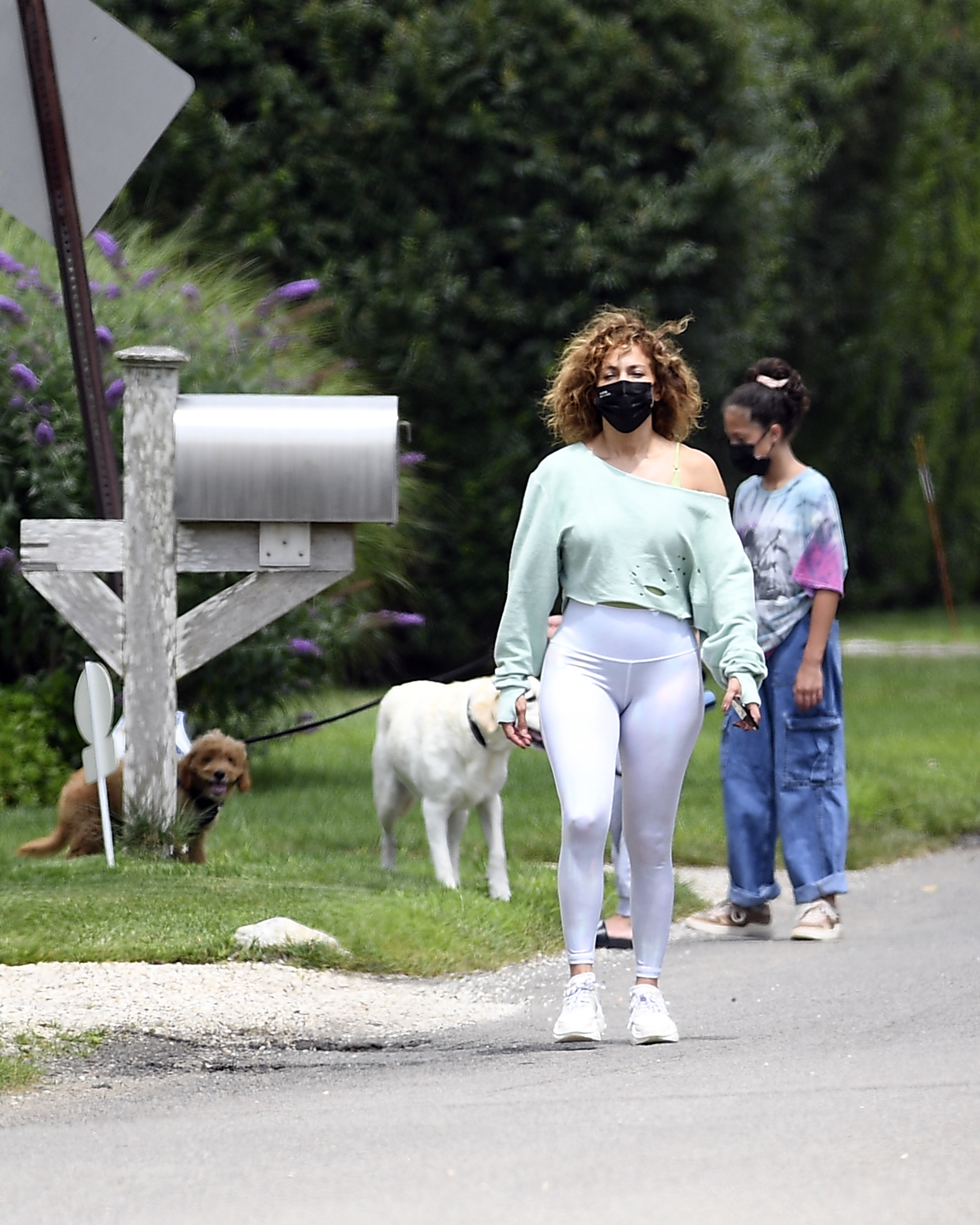 Jennifer Lopez walks dogs with kids Max and Emme in the Hamptons