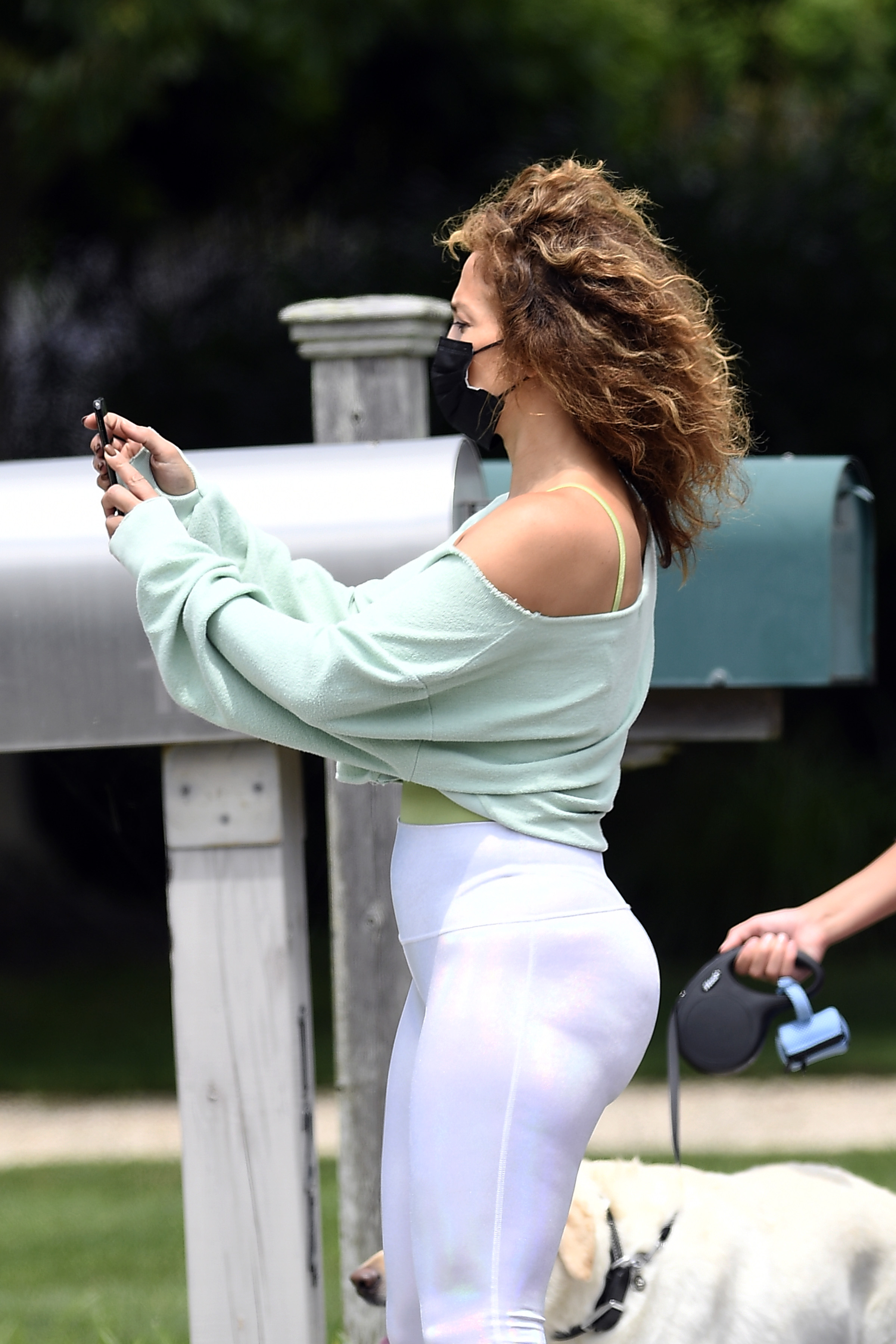 Jennifer Lopez walks dogs with kids Max and Emme in the Hamptons