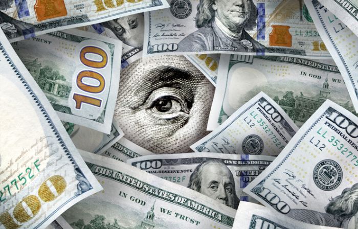 Conceptual American one hundred dollar bills pile