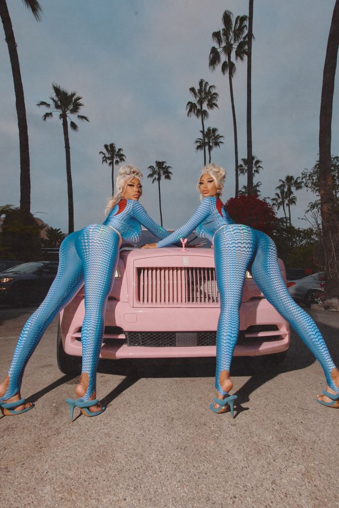 Shannade and Shannon Clermont wear blue jumpsuits pink Rolls Royce