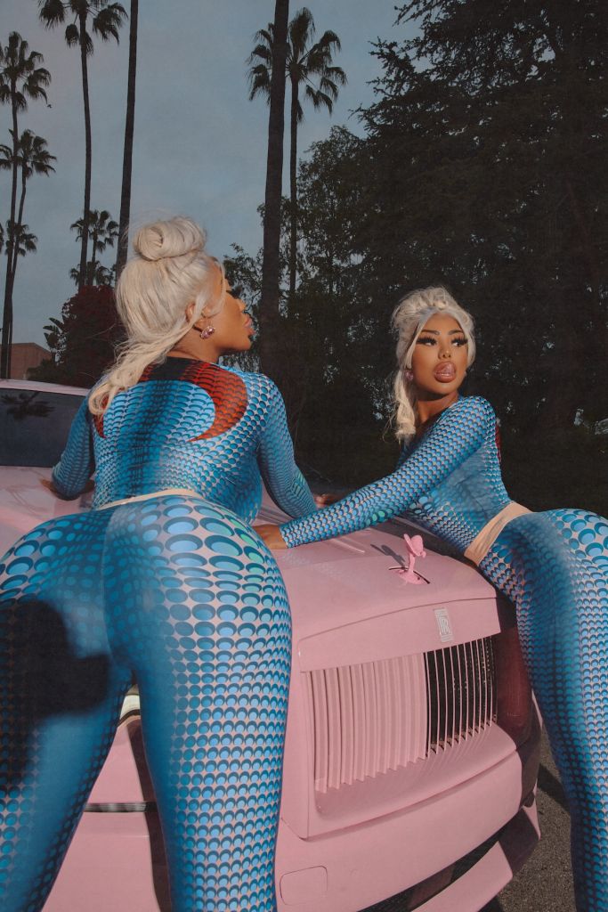 Shannade and Shannon Clermont wear blue jumpsuits pink Rolls Royce