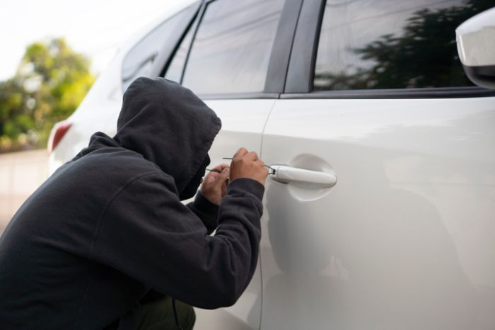 Man stealing a car