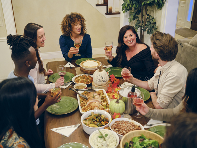 Friends Celebrating Thanksgiving Dinner Together