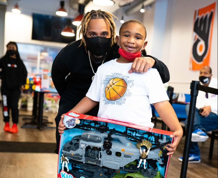 Derrick Hayes holiday giveback assets