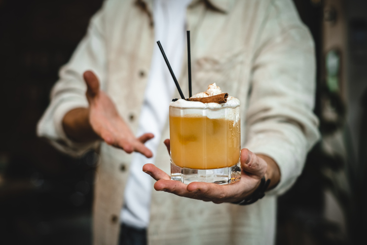 Man holding fresh cocktail