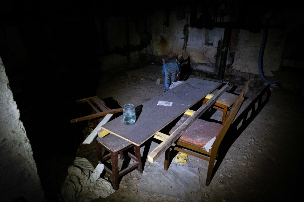 A view of a living room of an underground basement people...