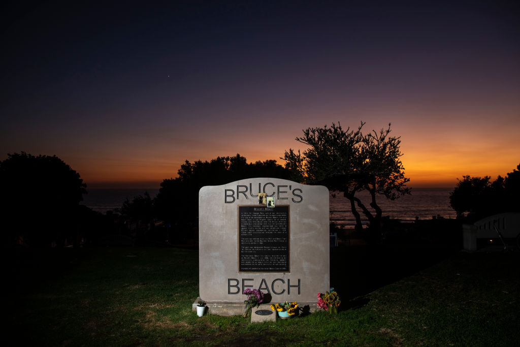 California Gov. Gavin Newsom signs SB 796 authorizing the return of beach-front land to the Bruce family, in Manhattan Beach, CA