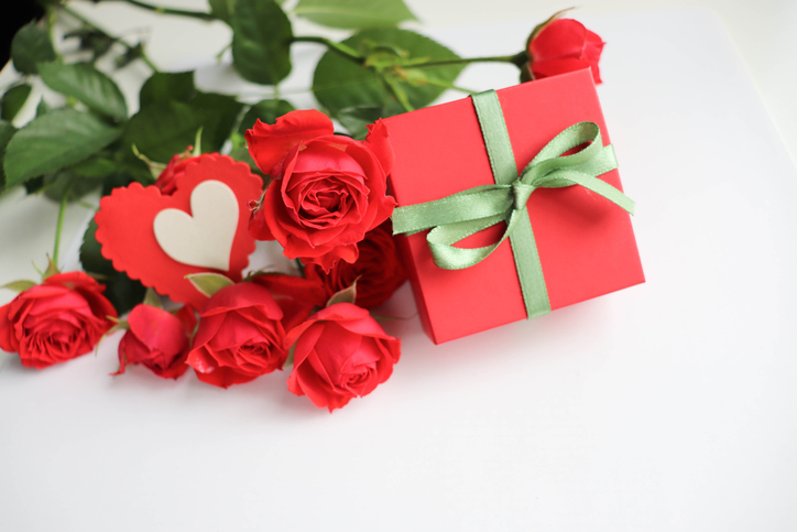 greeting card happy valentine's day. bouquet of roses and red heart