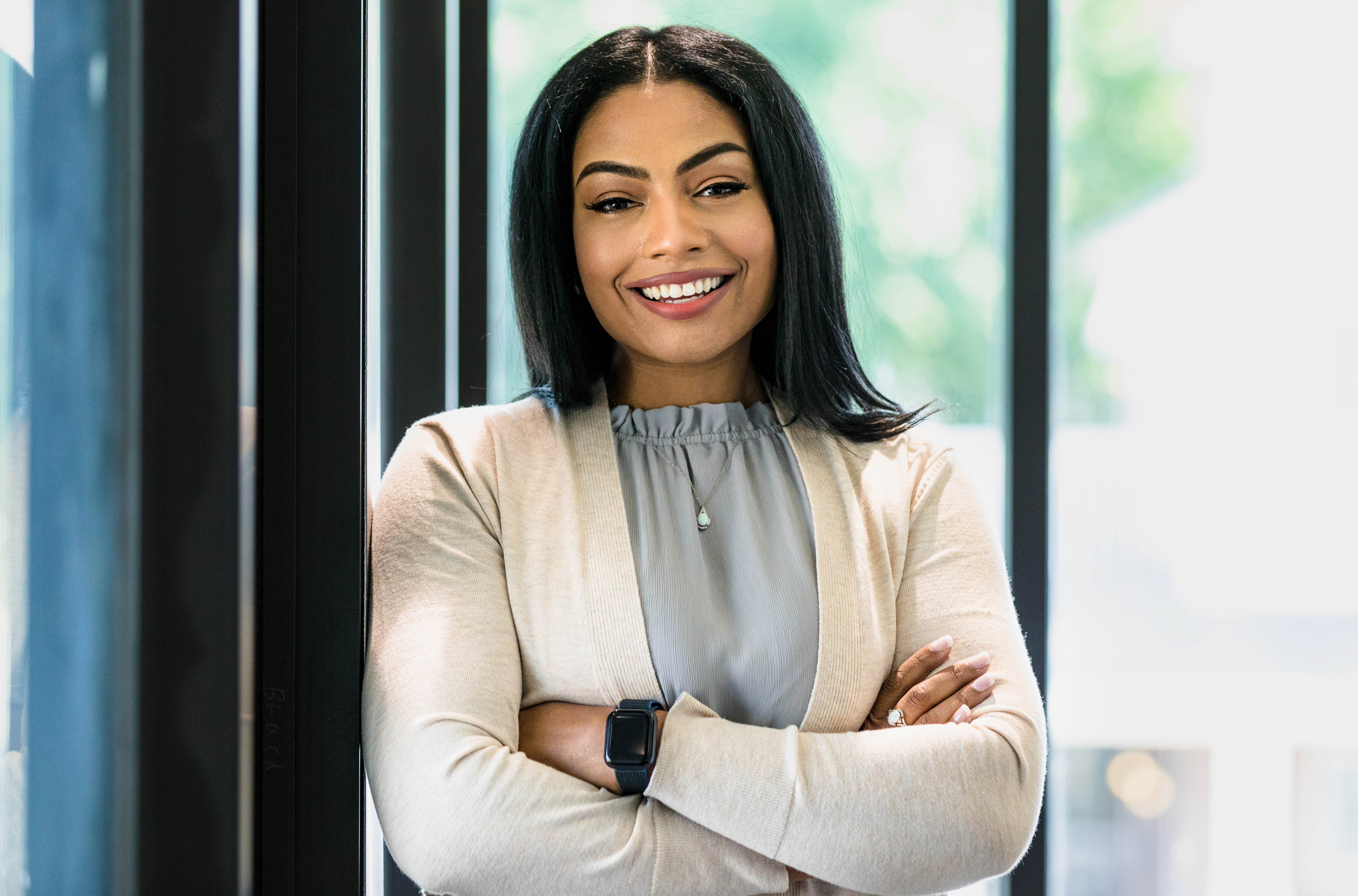 Successful, confident, mid adult professional smiles for camera - stock photo