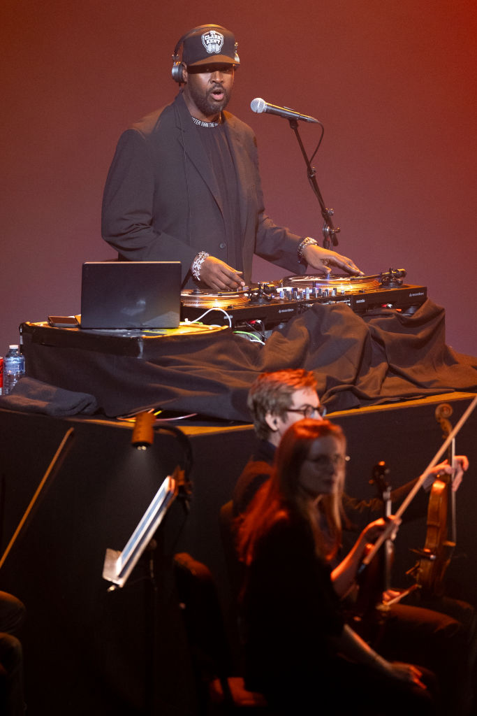 DJ Clark Kent performs at "An Orchestral Tribute To The Notorious B.I.G." By The Brooklyn Nets : Photocall At Theatre du Chatelet