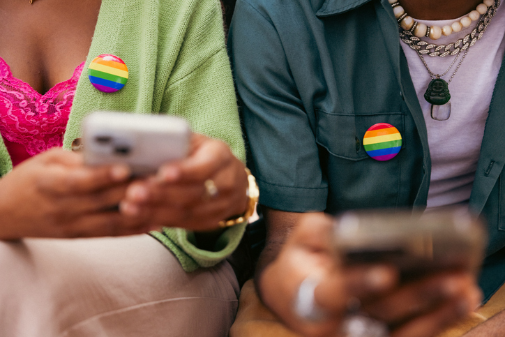 Activists texting on mobile phone