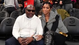 Simon Guobadia and Porsha Williams Attend Los Angeles Lakers v Atlanta Hawks