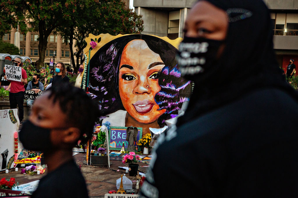 People protest a Kentucky grand jurys indictment of one of three police officers in the killing of Breonna Taylor, but not for her death