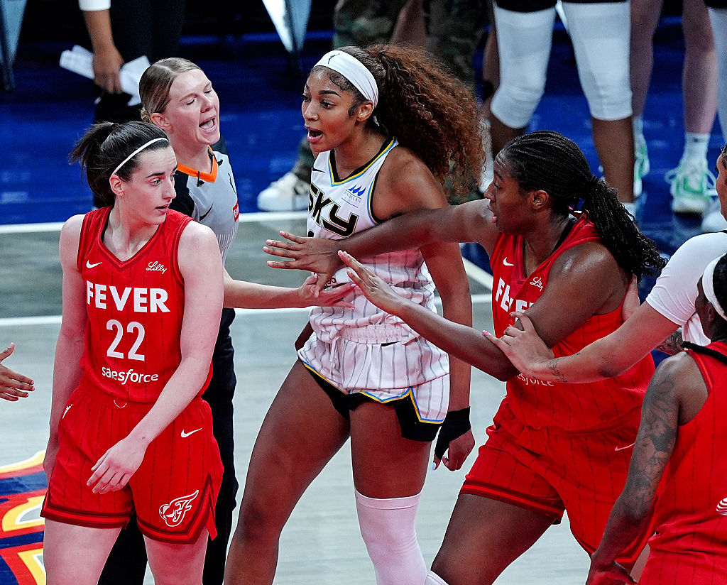 Chicago Sky forward Angel Reese (5) reacts after being fouled by Indiana Fever guard Caitlin Clark (22). WNBA: MAY 17 Chicago Sky at Indiana Fever
