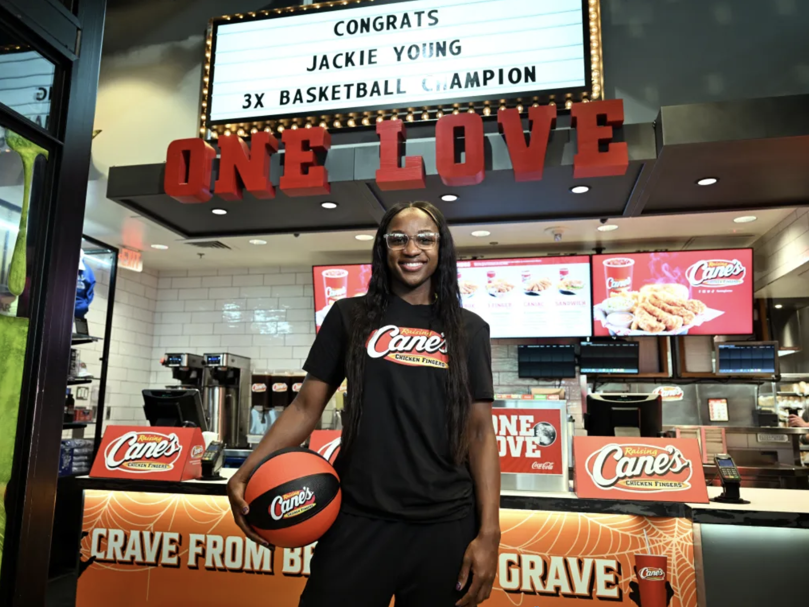 Serving Up Wins and Chicken Fingers! Las Vegas Aces Star Jackie Young Takes Fan Orders at Raising Cane’s Las Vegas Flagship Restaurant during a Celebratory “Shift” following her Third WNBA Championship Win